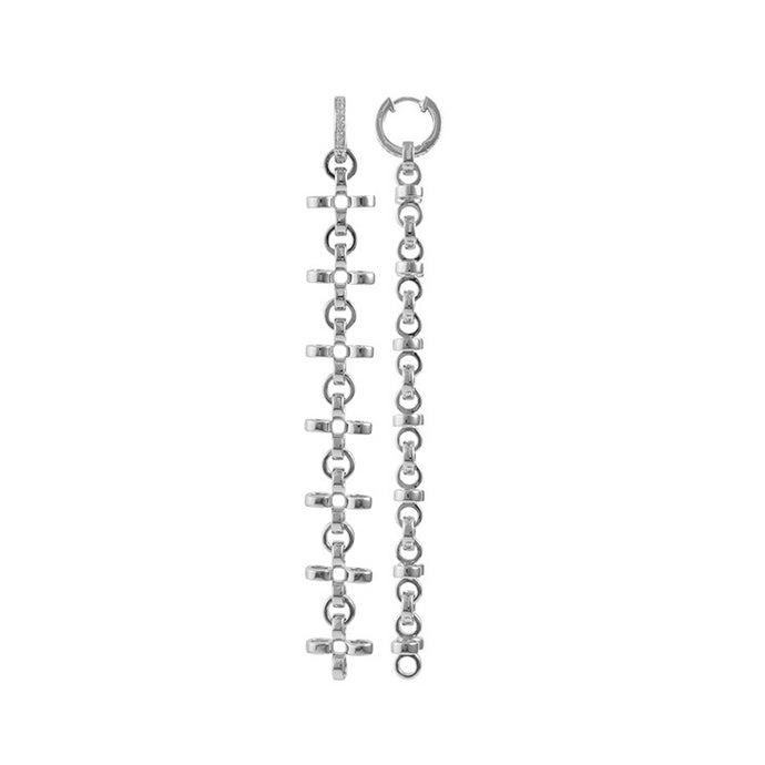 PANTOLIN CROSS CHAIN EARRINGS SILVER Elegant och välarbetade örhängen från Pantolin. Den lilla creolen som även kan användas separat är dekorerad små stenar, länkarna är formade som små kors.