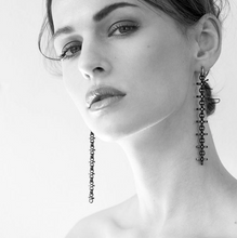 Load image into Gallery viewer, PANTOLIN FINE JEWELLERY CROSS CHAIN EARRINGS SILVER Elegant och välarbetade örhängen från Pantolin. Den lilla creolen som även kan användas separat är dekorerad små stenar, länkarna är formade som små kors.