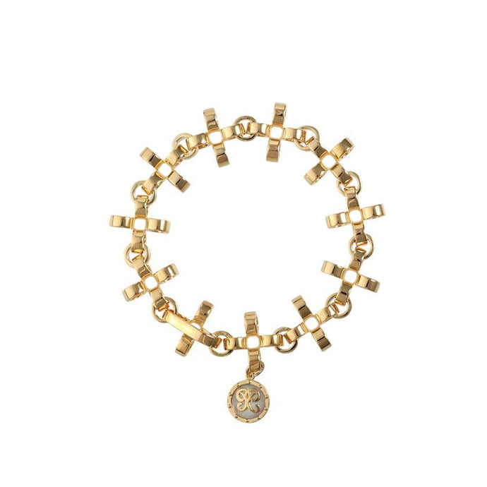 PANTOLIN CROSS CHAIN BRACELET GOLD Elegant och välarbetad armlänk från Pantolin. Länkarna är formade som små kors och knäpps med ett diskret lås.