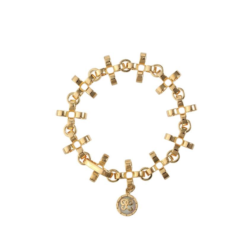 PANTOLIN CROSS CHAIN BRACELET GOLD Elegant och välarbetad armlänk från Pantolin. Länkarna är formade som små kors och knäpps med ett diskret lås.