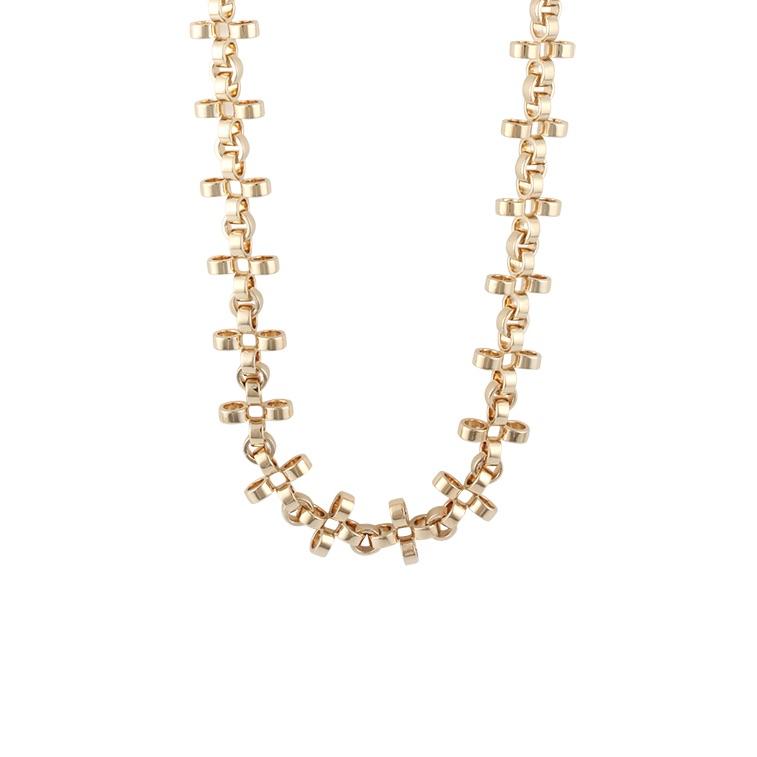 PANTOLIN CROSS CHAIN NECKLACE GOLD SHORT Elegant och välarbetad halslänh från Pantolin. Länkarna är formade som små kors och knäpps med ett diskret lås.